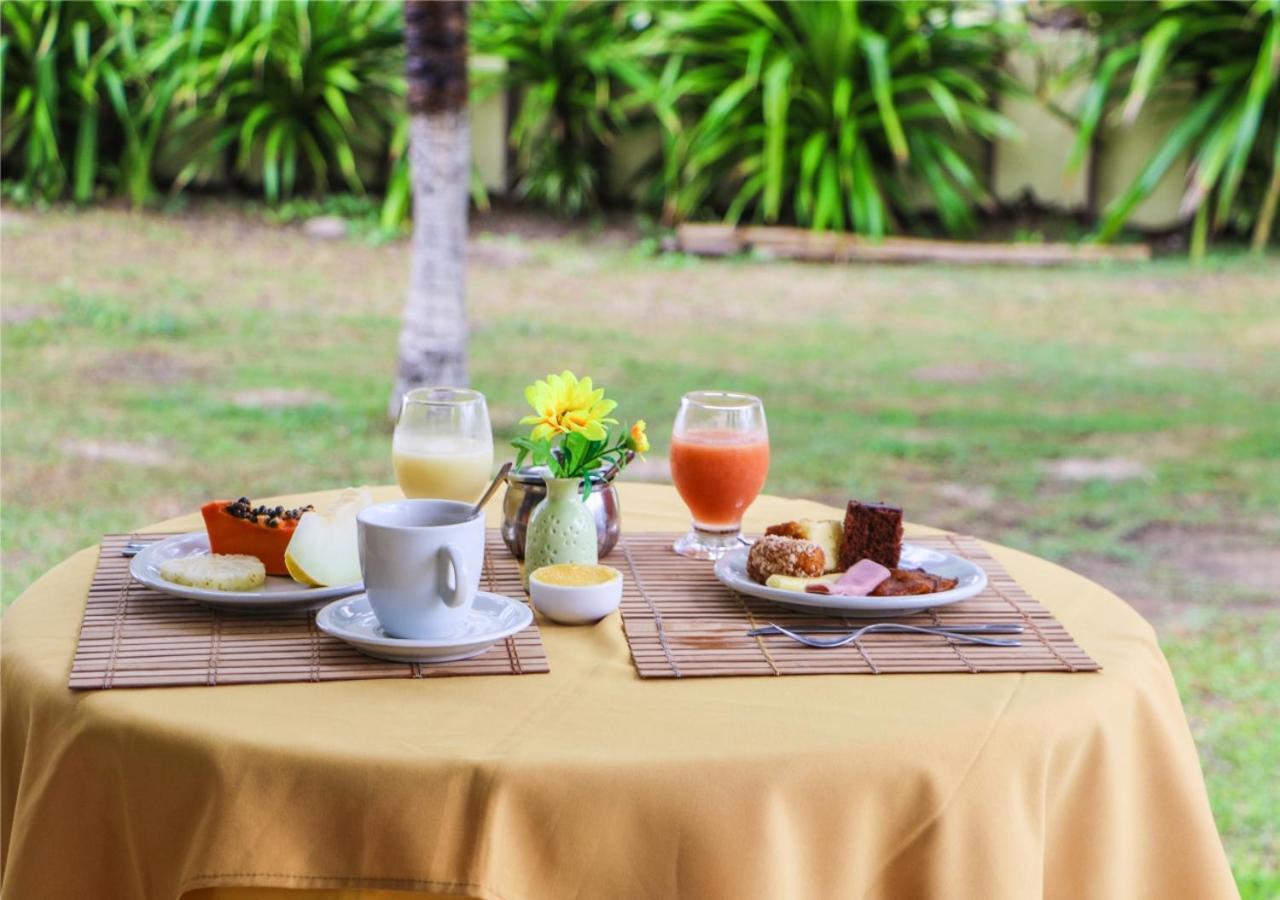 Girassol Praia Hotel Guaibim Bagian luar foto